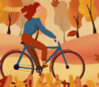 Kvinde cykler om efteråret